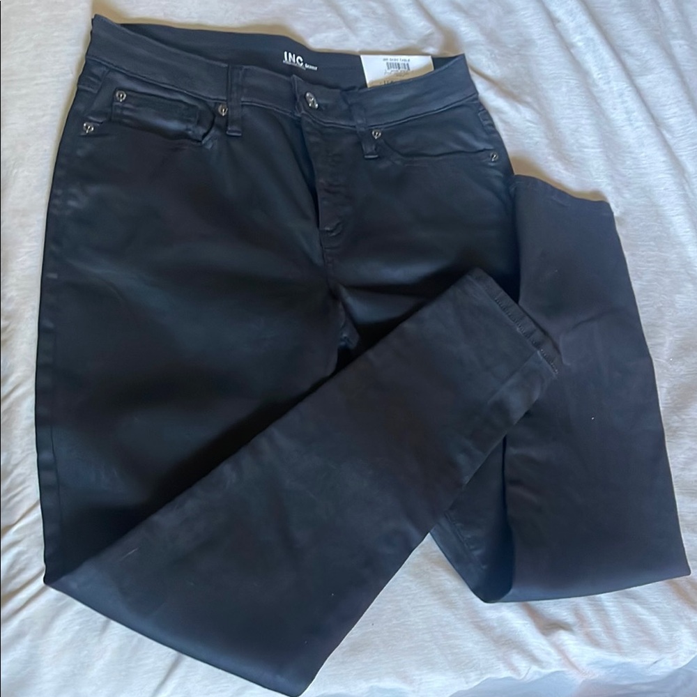 INC International Concepts women’s black wet look skinny Jeans